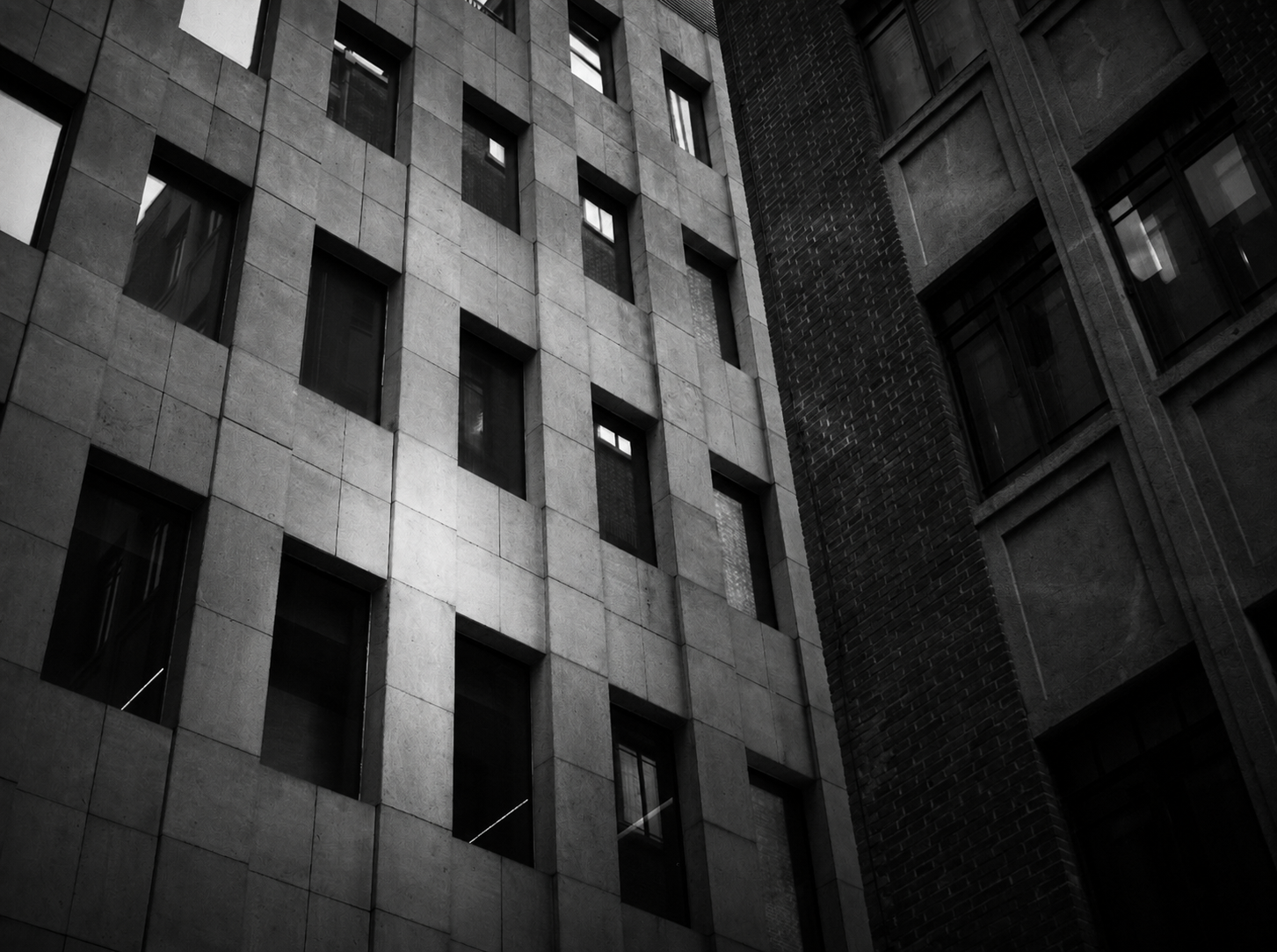 A black and white study of windows and architectural geometry